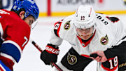 Oct 1, 2024; Montreal, Quebec, CAN; Ottawa Senators center Tim Stutzle (18) looks at the puck prior to the puck drop at face=off against Montreal Canadiens center Jake Evans (71) during the first period at Bell Centre. Mandatory Credit: David Kirouac-Imagn Images