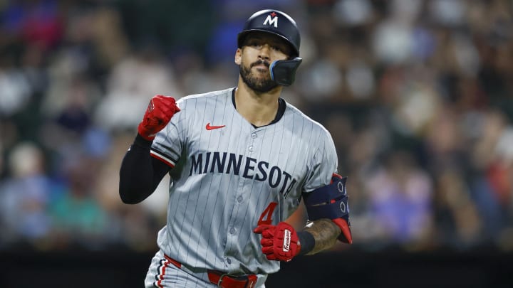 Jul 8, 2024; Chicago, Illinois, USA; Minnesota Twins shortstop Carlos Correa (4) rounds the bases after hitting a solo home run against the Chicago White Sox during the seventh inning at Guaranteed Rate Field. Mandatory Credit: Kamil Krzaczynski-USA TODAY Sports