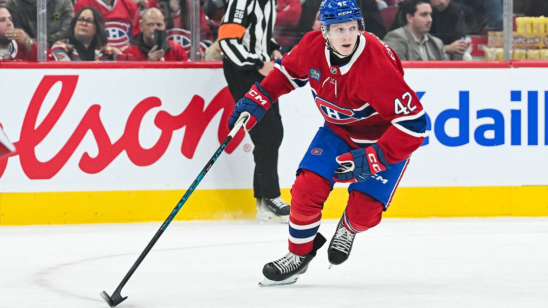 Oct 13, 2026; Montreal, Quebec, CAN; Montreal Canadiens defenseman Adam Engstrom (42) plays the puck against the Buffalo Sabres during the first period at Bell Centre. Mandatory Credit: David Kirouac-Imagn Images
