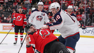Columbus Blue Jackets left wing Dmitri Voronkov (10) and New Jersey Devils right wing Stefan Noesen (11) fight: Ed Mulholland-Imagn Images