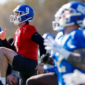 Memphis QB Seth Henigan (9) warms up during the first University of Memphis spring football practice at the Billy J. Murphy Athletic Complex on Tuesday, March 19, 2024.