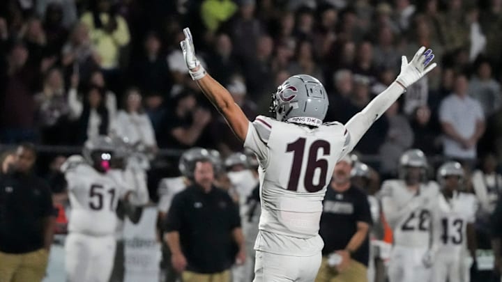 Collierville’s Ayden Jacobs (16) celebrates after making a stop during the game between Collierville High School and Houston High School in Germantown, Tenn., on Friday, November 1, 2024.
