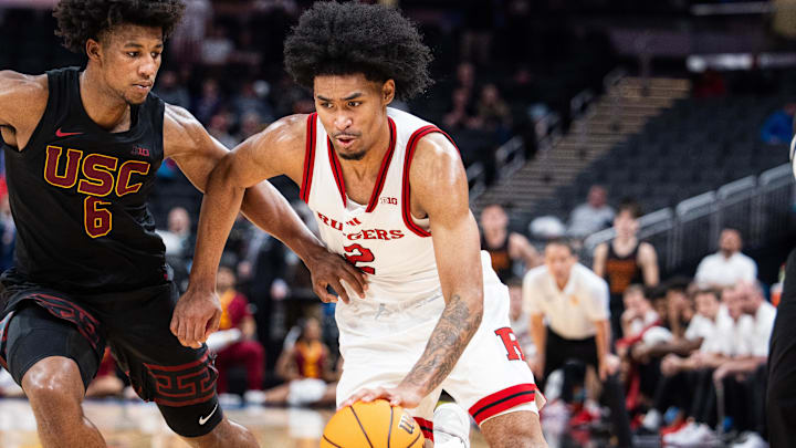 Mar 12, 2025; Indianapolis, IN, USA; Rutgers Scarlet Knights guard Dylan Harper (2) dribbles the ball while USC Trojans guard Wesley Yates III (6) defends in the second half at Gainbridge Fieldhouse. Mandatory Credit: Trevor Ruszkowski-Imagn Images Mar 12, 2025; Indianapolis, IN, USA; Rutgers Scarlet Knights guard Dylan Harper (2) dribbles the ball while USC Trojans guard Wesley Yates III (6) defends in the second half at Gainbridge Fieldhouse. Mandatory Credit: Trevor Ruszkowski-Imagn Images