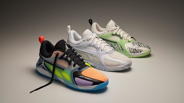 Three multi-color Jordan Brand basketball shoes.