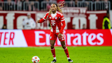 Sacha Boey in action for Bayern Munich against Borussia Dortmund.