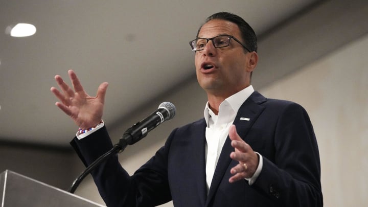 Aug 20, 2024; Chicago, IL, USA; Pennsylvania Governor Josh Shapiro speaks to a crowd at a delegate breakfast during the second day of the Democratic National Convention in Chicago. Mandatory Credit: Megan Smith-USA TODAY