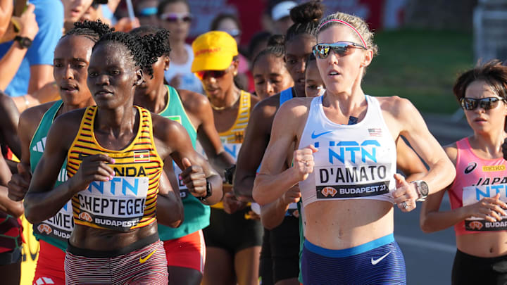 Aug 26, 2023; Budapest, Hungary; Rebecca Cheptegei (UGA) and Keira D'Amato (USA) run during the World Athletics Championships Budapest 23 women's marathon. 