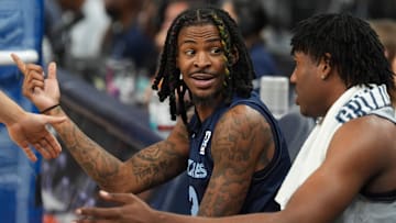 Grizzlies' Ja Morant (12) and GG Jackson II (45) talk on the bench during open practice at FedExForum in Memphis, Tenn., on Sunday, October 6, 2024.