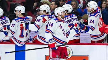 Dec 4, 2025; Ottawa, Ontario, CAN; New York Rangers defenseman Vladislav Gavrikov (44) celebrates with his teammates at the bench his goal against the Ottawa Senators during the first period at Canadian Tire Centre. Mandatory Credit: David Kirouac-Imagn Images
