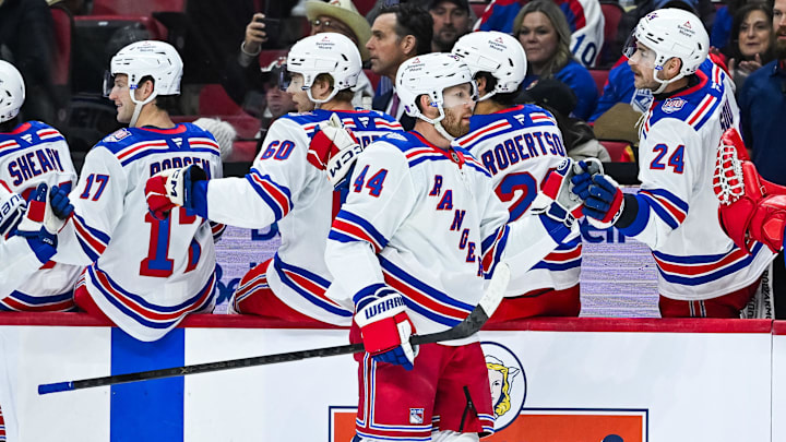 Dec 4, 2025; Ottawa, Ontario, CAN; New York Rangers defenseman Vladislav Gavrikov (44) celebrates with his teammates at the bench his goal against the Ottawa Senators during the first period at Canadian Tire Centre. Mandatory Credit: David Kirouac-Imagn Images