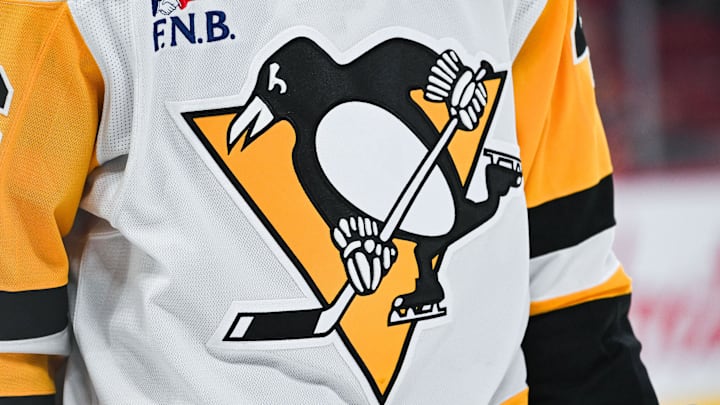 Dec 12, 2024; Montreal, Quebec, CAN; View of a Pittsburgh Penguins logo on a jersey worn by a member of the team during the second period at Bell Centre. 