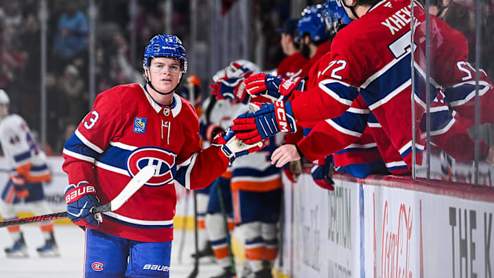 Feb 26, 2026; Montreal, Quebec, CAN; Montreal Canadiens right wing Cole Caufield (13) celebrates his goal against the New York Islanders with teammates during the third period at Bell Centre. Mandatory Credit: David Kirouac-Imagn Images