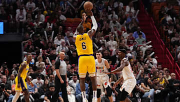 Dec 28, 2022; Miami, Florida, USA; Los Angeles Lakers forward LeBron James (6) attempts a three point shot against the Miami Heat during the second half at FTX Arena. Mandatory Credit: Jasen Vinlove-Imagn Images