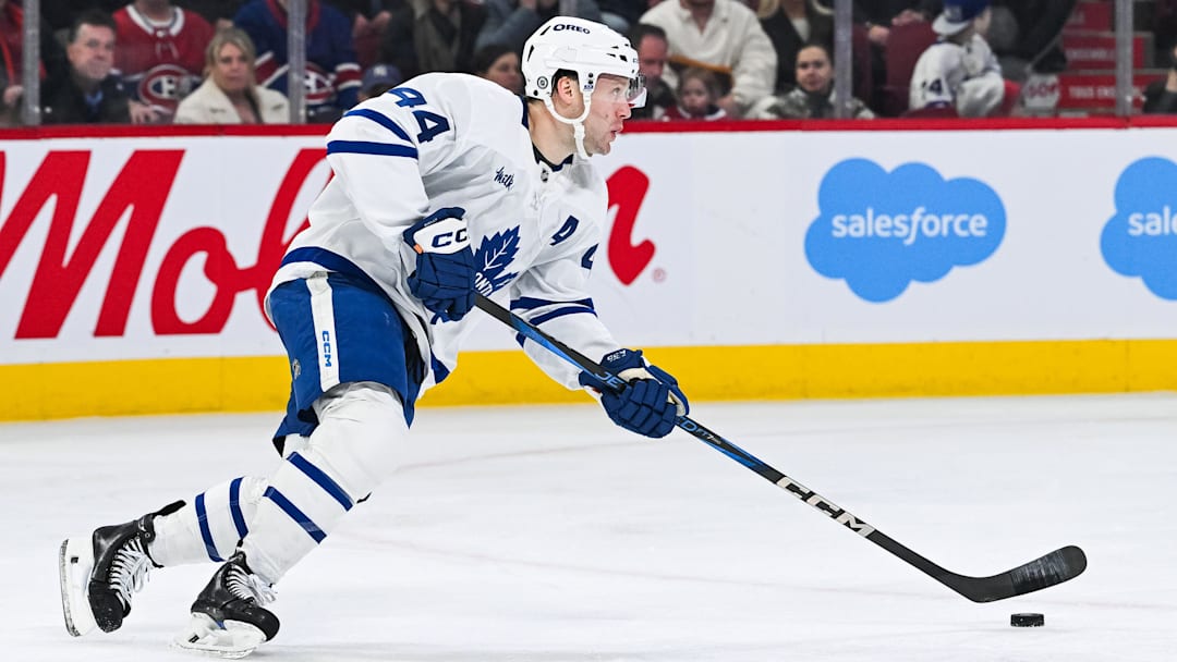 Jan 18, 2025; Montreal, Quebec, CAN; Toronto Maple Leafs defenseman Morgan Rielly (44) plays the puck against the Montreal Canadiens during the second period at Bell Centre. Mandatory Credit: David Kirouac-Imagn Images