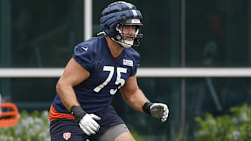 Chicago Bears offensive tackle Ozzy Trapilo (75) warms up during minicamp at Halas Hall.