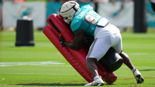 Aug 2, 2022; Miami Gardens, Florida, US; Miami Dolphins defensive lineman Owen Carney Jr. (93) runs a drill during training camp at Baptist Health Training Complex. Mandatory Credit: Jasen Vinlove-USA TODAY Sports