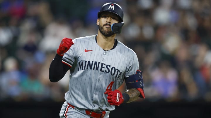 Jul 8, 2024; Chicago, Illinois, USA; Minnesota Twins shortstop Carlos Correa (4) rounds the bases after hitting a solo home run against the Chicago White Sox during the seventh inning at Guaranteed Rate Field. Mandatory Credit: Kamil Krzaczynski-USA TODAY Sports