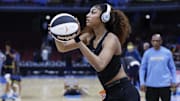 Chicago Sky forward Angel Reese warms up before a WNBA game against the Indiana Fever.