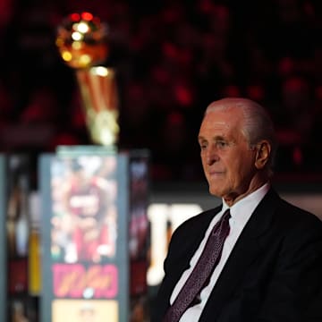 Jan 19, 2024; Miami, Florida, USA; Miami Heat president Pat Riley sits on the court for the jersey retirement ceremony for former player Udonis Haslem during halftime of the game between the Miami Heat and the Atlanta Hawks Kaseya Center. Mandatory Credit: Jasen Vinlove-Imagn Images