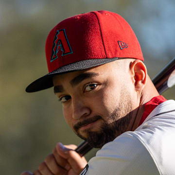 Feb 21, 2024; Scottsdale, AZ, USA; Arizona Diamondbacks infielder Jordan Lawlar (10) poses for a picture for MLB media day at Salt River Fields. Mandatory Credit: Allan Henry-Imagn Images