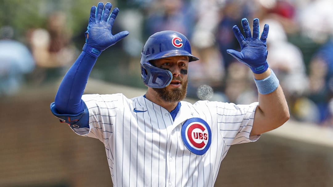 Jun 15, 2025; Chicago, Illinois, USA; Chicago Cubs first baseman Michael Busch (29) celebrates after hitting a double against the Pittsburgh Pirates during the first inning at Wrigley Field