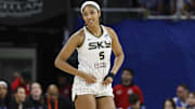 Chicago Sky forward Angel Reese smiles during the second half of a WNBA pre-season game against the Minnesota Lynx.