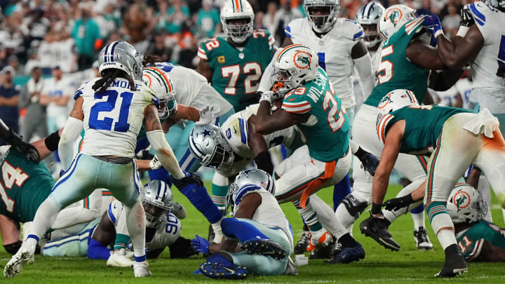 Miami Dolphins running back Jeff Wilson Jr. (23) rushes for a first down against the Dallas Cowboys during the second half at Hard Rock Stadium last season.