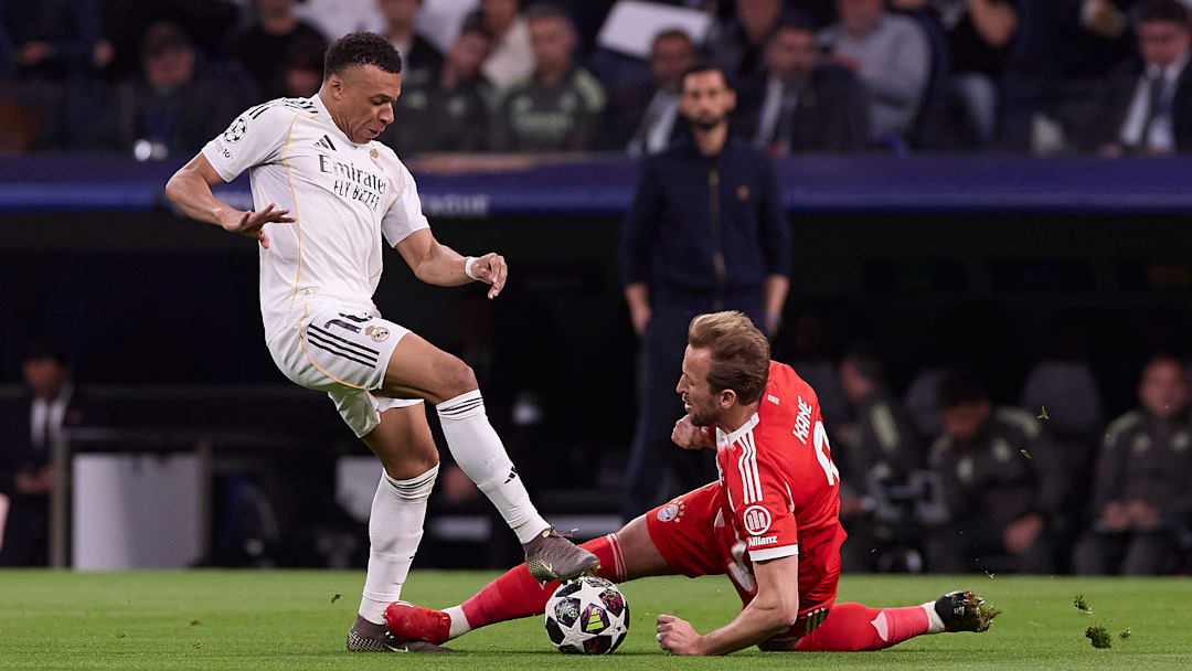 Kylian Mbappe (L) of Real Madrid CF and Harry Kane (R) of FC