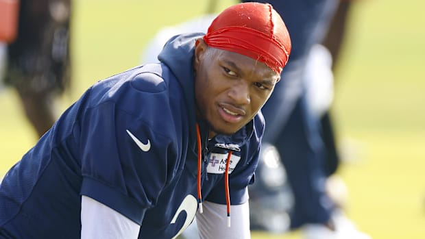 Chicago Bears wide receiver DJ Moore (2) warms up during training camp at Halas Hall.