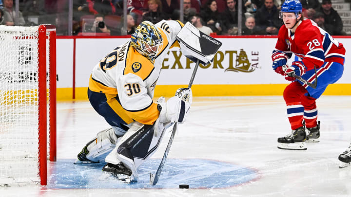 Jan 12, 2023; Montreal, Quebec, CAN; Nashville Predators goalie Yaroslav Askarov (30) shoots the puck away from his net against the Montreal Canadiens during the second period at Bell Centre. Mandatory Credit: David Kirouac-USA TODAY Sports