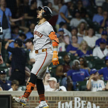 San Francisco Giants second baseman Thairo Estrada (39) celebrates as he crosses home plate after hitting a three-run home run against the Chicago Cubs during the ninth inning at Wrigley Field on June 17.