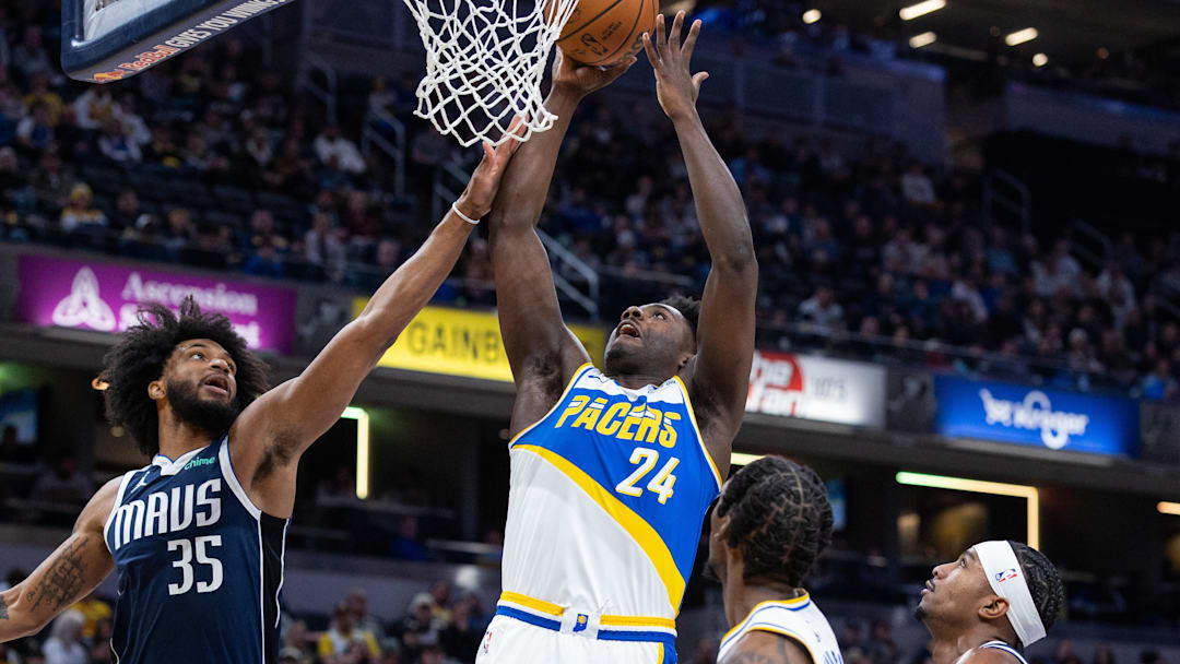 Feb 22, 2026; Indianapolis, Indiana, USA; Indiana Pacers forward Kobe Brown (24) shoots the ball while Dallas Mavericks forward Marvin Bagley III (35) defends in the first half at Gainbridge Fieldhouse. Mandatory Credit: Trevor Ruszkowski-Imagn Images