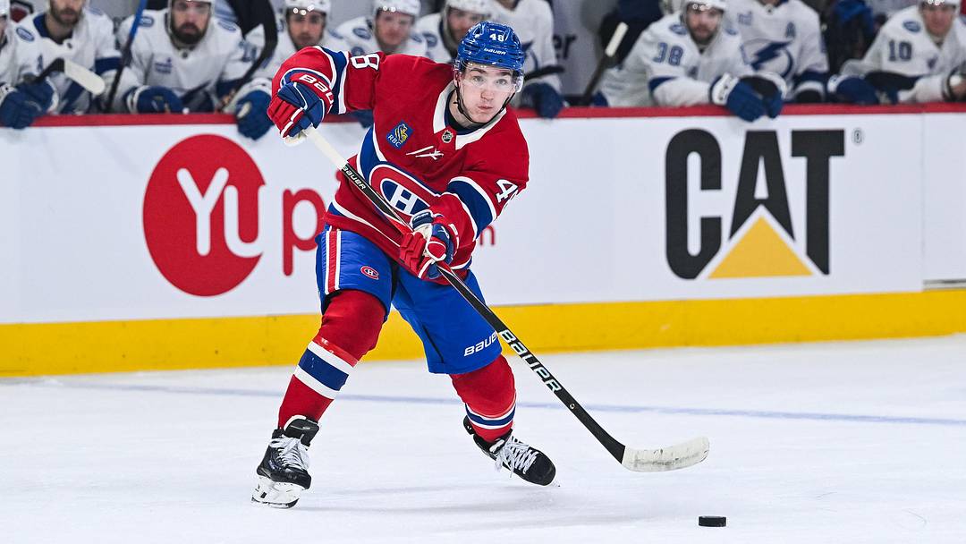 Apr 26, 2026; Montreal, Quebec, CAN; Montreal Canadiens defenseman Lane Hutson (48) passes the puck during the first period in game four of the first round of the 2026 Stanley Cup Playoffs at Bell Centre. Mandatory Credit: David Kirouac-Imagn Images