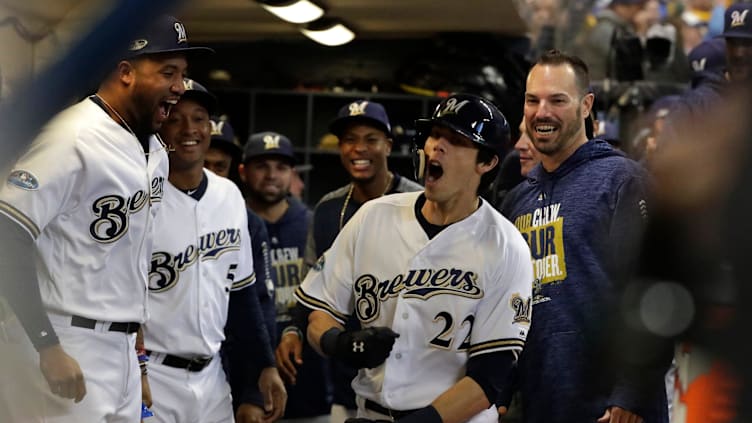 Milwaukee Brewers right fielder Christian Yelich (22) celebrates his home run in the 1st inning. The Brewers play the Los Angeles Dodgers in Game 7 of the National League Championship Series baseball game Saturday, October 20, 2018 at Miller Park in Milwaukee, Wis. 

RICK WOOD/MILWAUKEE JOURNAL SENTINEL