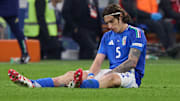 Calafiori went down holding his knee