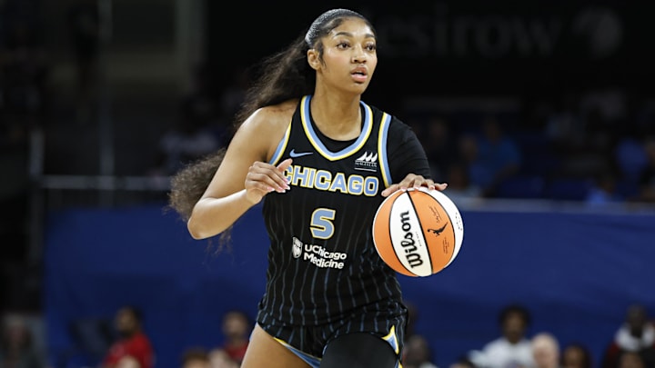 Chicago Sky forward Angel Reese (5) looks to pass the ball against the Las Vegas Aces.