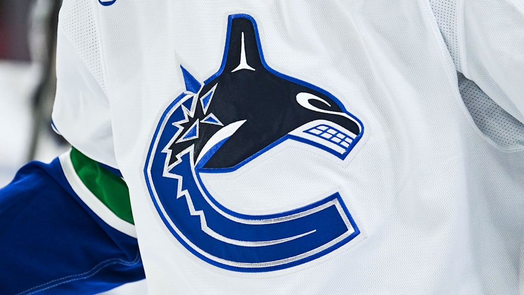 Jan 12, 2026; Montreal, Quebec, CAN; View of a Vancouver Canucks logo on a jersey worn by a member of the team during the second period at Bell Centre. Mandatory Credit: David Kirouac-Imagn Images