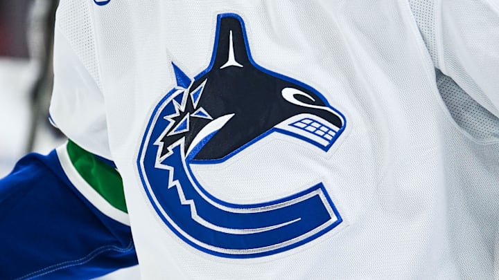 Jan 12, 2026; Montreal, Quebec, CAN; View of a Vancouver Canucks logo on a jersey worn by a member of the team during the second period at Bell Centre. Mandatory Credit: David Kirouac-Imagn Images