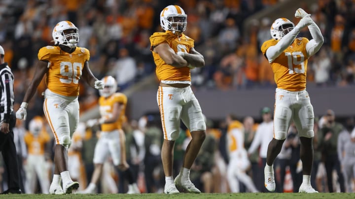 Nov 25, 2023; Knoxville, Tennessee, USA; Tennessee Volunteers defensive lineman Dominic Bailey (90) and defensive lineman Tyler Baron (9) and defensive lineman Joshua Josephs (19) celebrate after a sack against the Vanderbilt Commodores during the second half at Neyland Stadium. Mandatory Credit: Randy Sartin-USA TODAY Sports