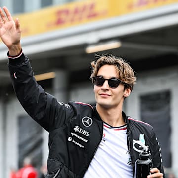 Jun 9, 2024; Montreal, Quebec, CAN; Mercedes driver George Russell (GBR) salutes the crowd during the drivers parade of the Canadien Grand Prix at Circuit Gilles Villeneuve. Mandatory Credit: David Kirouac-Imagn Images