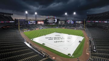 Jul 5, 2023; Chicago, Illinois, USA; A tarp covers the infield during a rain delay before a game