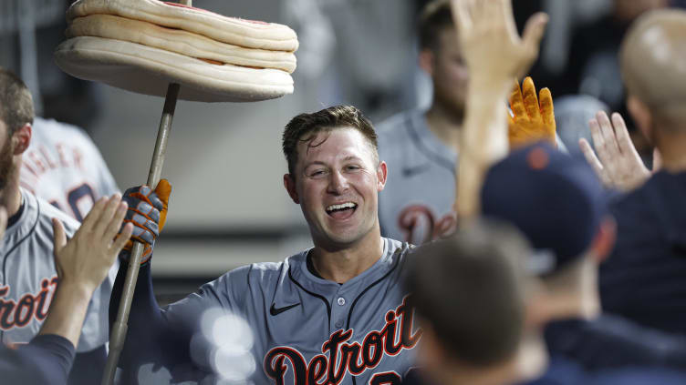 Aug 26, 2024; Chicago, Illinois, USA; Detroit Tigers first baseman Spencer Torkelson (20) celebrates with teammates in the dugout after hitting a three-run home run against the Chicago White Sox during the seventh inning at Guaranteed Rate Field. Mandatory Credit: Kamil Krzaczynski-USA TODAY Sports