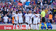 Real Madrid celebrate their winning goal in the first half 