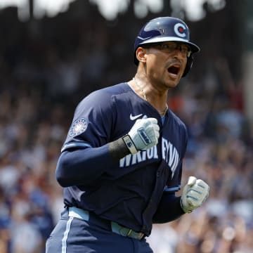 Aug 2, 2024; Chicago, Illinois, USA; Chicago Cubs catcher Christian Bethancourt rounds the bases after hitting a home run.