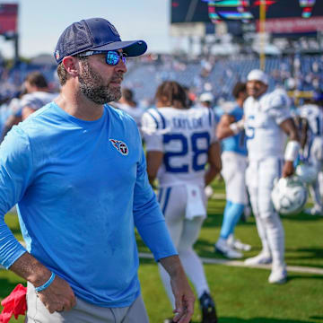 Tennessee Titans coach Brian Callahan exits the field after the game against the Indianapolis Colts at Nissan Stadium in Nashville, Tenn., Sunday, Sept. 21, 2025.