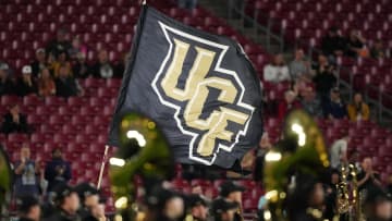 Dec 22, 2023; Tampa, FL, USA; A general view of the UCF Knights flag while the band performs prior to the Gasparilla Bowl between the Georgia Tech Yellow Jackets and the UCF Knights at Raymond James Stadium. Mandatory Credit: Jasen Vinlove-USA TODAY Sports