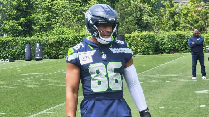 Seahawks tight end Pharaoh Brown listens to instructions during a drill in Thursday's OTA session at the VMAC.