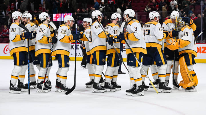 Dec 10, 2023; Montreal, Quebec, CAN; Nashville Predators players gather to celebrate the win against