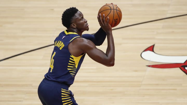 Dec 26, 2020; Chicago, Illinois, USA; Indiana Pacers guard Victor Oladipo (4) shoots a free throw against the Chicago Bulls during the second half of an NBA game at United Center. Mandatory Credit: Kamil Krzaczynski-USA TODAY Sports