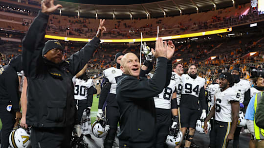 Nov 29, 2025; Knoxville, Tennessee, USA;  Vanderbilt Commodores head coach Clark Lea celebrates with his team after a game against the Tennessee Volunteers at Neyland Stadium. Mandatory Credit: Randy Sartin-Imagn Images